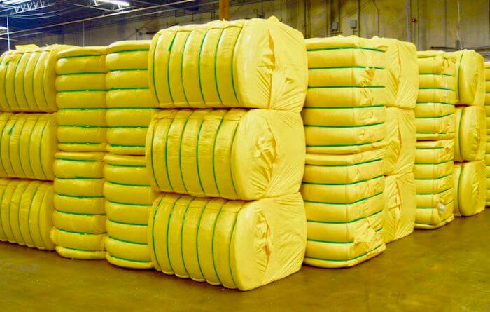 Bales of synthetic fiber